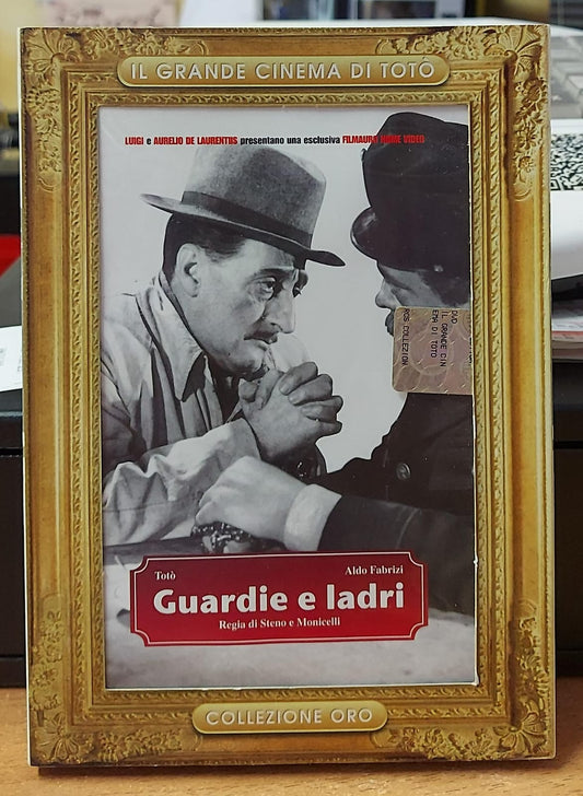 GUARDIE E LADRI
