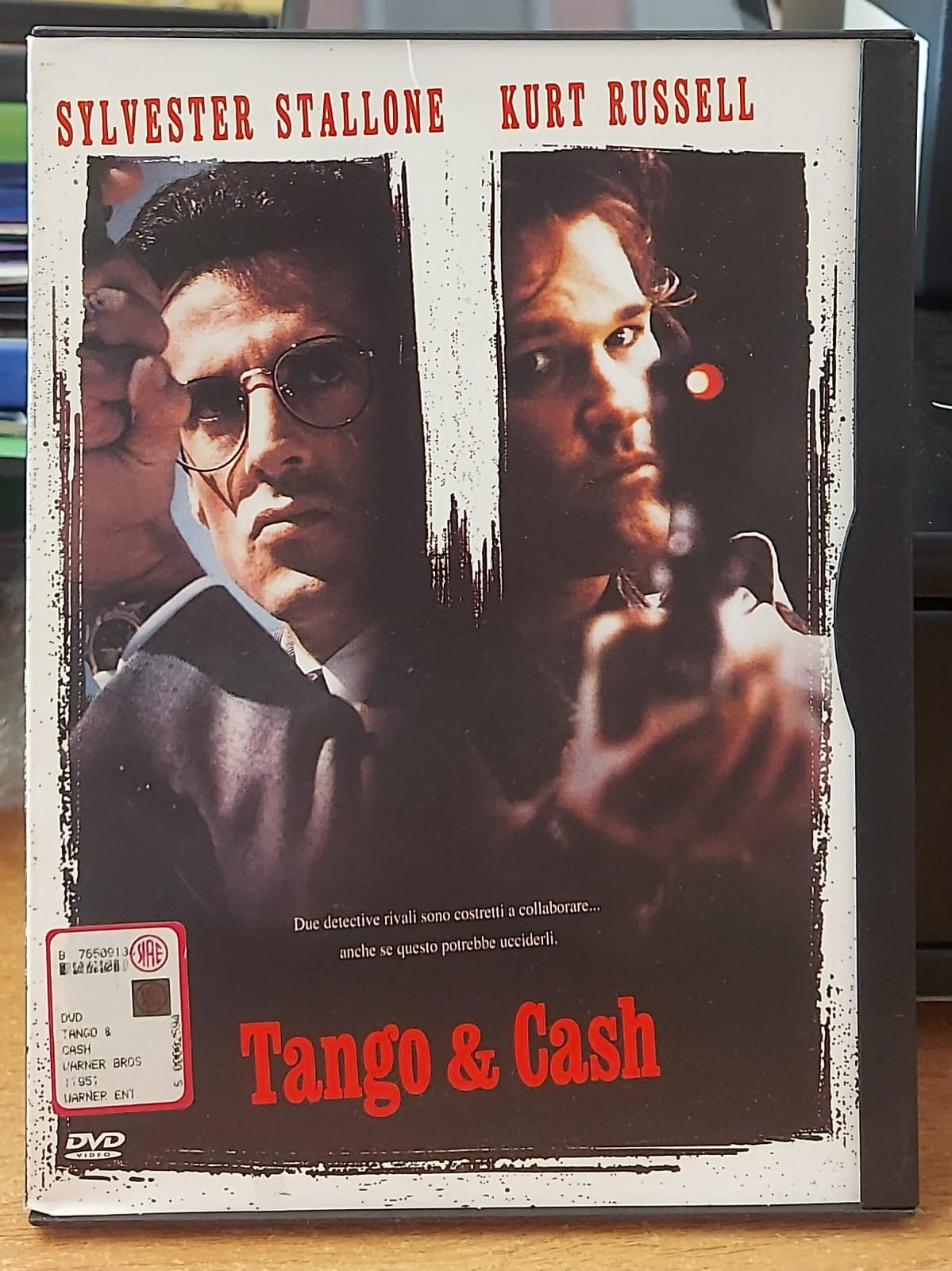 Copertina frontale del DVD Tango & Cash con Sylvester Stallone e Kurt Russell