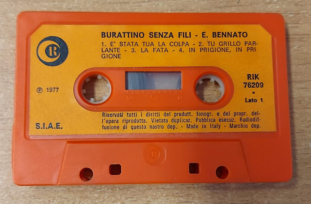 Edoardo Bennato Burattino senza fili musicassetta arancione, lato 1