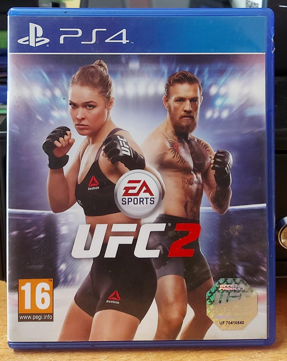 EA Sports UFC 2 PS4 usato - fronte con Ronda Rousey e Conor McGregor