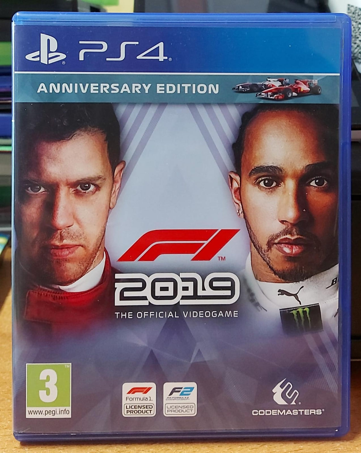 F1 2019 Anniversary Edition PS4 usato - fronte con Vettel e Hamilton
